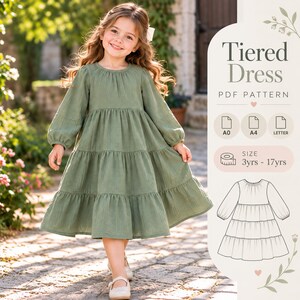 Puede incluir: Un vestido de color verde salvia de manga larga con niveles, escote redondo y secciones de falda fruncidas. La imagen incluye el texto Tiered Dress PDF Pattern, A0, A4, LETTER y SIZE 3yrs - 17yrs, junto a un dibujo lineal en blanco y negro.
