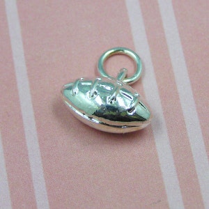 T19 Silver Football Pigskin NFL NCAA Canadian Gridiron Charm