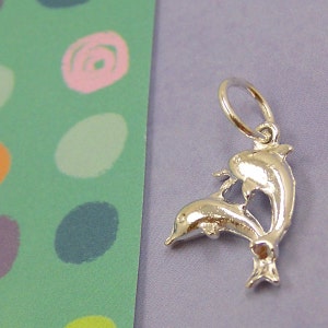 096 Silver Leaping Dolphins Charm