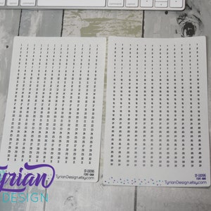 May include: Two sheets of white paper with black numbers from 1 to 31 printed in rows. The sheets are labeled "ST-10096" and "TyrianDesign.etsy.com".