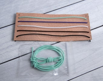 Traveler's Notebook Restrap kit. Available in various colors.