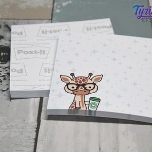 May include: A stack of white Post-it notes with a light blue background and a cartoon giraffe wearing glasses and holding a cup of coffee. The background has a pattern of light blue stars.