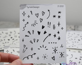 Könnte beinhalten: Ein Blatt weißes Aufkleberpapier mit schwarzen Kritzel-Designs. Die Designs beinhalten Sterne, Herzen, Pfeile, Kringel und andere abstrakte Formen. Der Text "TyrianDesign" und "ST-10533" ist in den oberen Ecken des Blattes gedruckt.