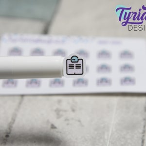 May include: A sheet of stickers with a light blue background and a black outline. The stickers feature a simple icon of a clipboard with a checkmark. The text "Tyrian Design" is visible in the background.