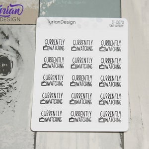 May include: A sheet of 15 white stickers with black text and a small television icon. Each sticker says "CURRENTLY WATCHING".