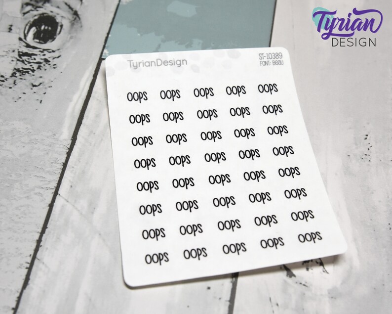 May include: A sheet of white sticker paper with 30 black "Oops" stickers arranged in a grid pattern. The stickers are printed in a handwritten font.