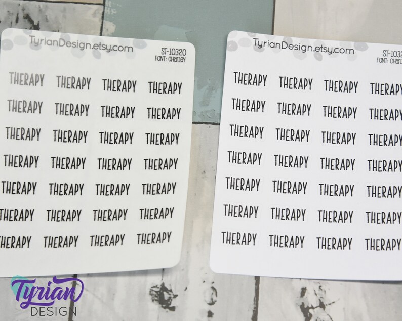 May include: A sheet of white sticker paper with 24 black and white stickers that say "THERAPY" in a simple font. The stickers are arranged in four rows of six stickers each.