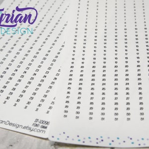 May include: A white sheet of paper with a grid of numbers from 1 to 31, repeated across the page. The numbers are in black ink and are written in a cursive font. The text "Tyrian DESIGN" is at the top of the page in a purple cursive font. The text "ST-10096 FONT: GMM TyrianDesign.etsy.com" is at the bottom of the page.