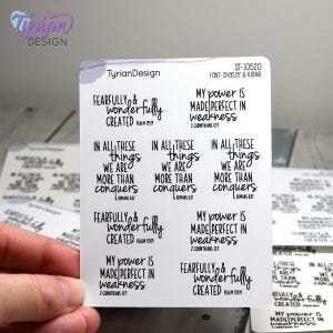 May include: A sheet of clear stickers with various bible verses printed on them. The verses include "Fearfully and wonderfully created", "My power is made perfect in weakness", and "In all these things we are more than conquerors".