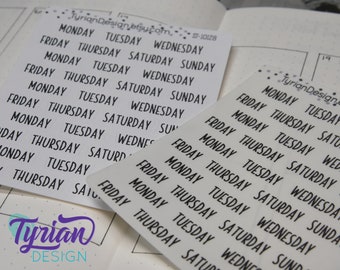 May include: A sheet of white sticker paper with black text. The text reads "MONDAY TUESDAY WEDNESDAY FRIDAY THURSDAY SATURDAY SUNDAY" repeated multiple times. The stickers are for use in a planner or journal.