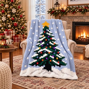 Anleitung für eine grob gestrickte Weihnachtsbaumdecke zum Fingerstricken und Stricken mit dem Strickrahmen. Festliche Überwurfdecke.