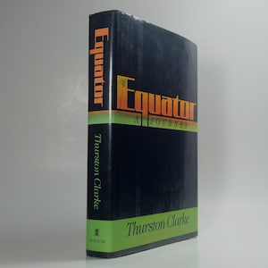 May include: A hardcover book titled Equator: A Journey by Thurston Clarke. The black dust jacket features orange and yellow gradient lettering for the title, a green horizontal band at the bottom, and the publisher logo Morrow at the base.