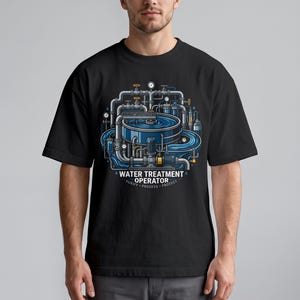 May include: A black t-shirt featuring a graphic illustration of a complex water treatment system with blue water, pipes, valves, and gauges. The text reads WATER TREATMENT OPERATOR, PURIFY, PROCESS, PROTECT in white and blue lettering below the graphic.