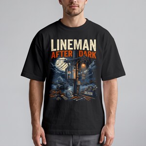 Monteur na zonsondergang, nutsbedrijf, zwart katoenen T-shirt