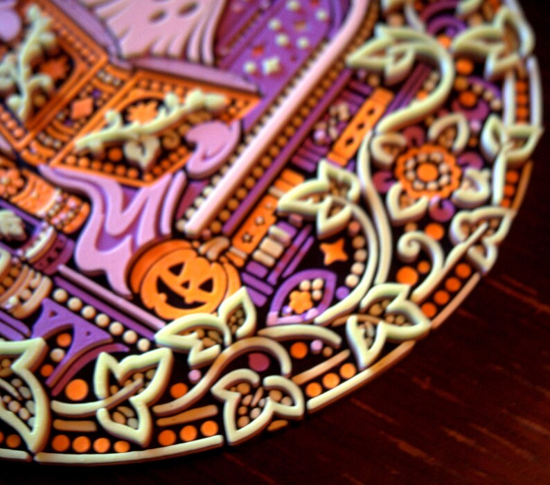 Full view of the Midnight Reader PLA wall relief and its multicolor design