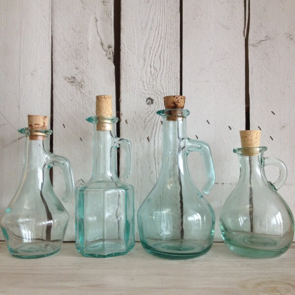 reserved SALE Vintage 4 mint green glass decanters /  supply bottles for oils / mint green pitcher /  vintage kitchen / vintage bathroom