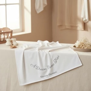 Maison Illuminé. | A Dream Come True Baby Swaddle Blanket | White, Script Text