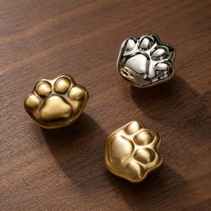 猫の足跡型キャビネットノブ、かわいい動物の引き出し取っ手、真鍮製家具金具、ユニークなキッチンキャビネットハンドル、猫好きへのギフト、ドレッサーノブ
