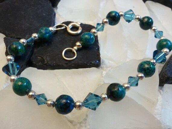 Items similar to Blue-Green Natural Beads with Swarovski and Silver ...
