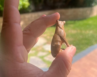 Miniature German Shepherd Satue or Sculpture. Carved from a solid block of Walnut. This Figurine is in a Sitting pose.