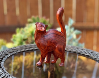 Giant Wooden Cat Figurine. Made of solid Padauk and different hardwoods. very elegant cat sculpture.