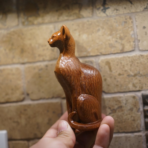 Abyssinian Wooden Cat Figurine. Made of solid Lacewood and different hardwoods. very elegant cat sculpture.