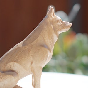 White German Shepherd Satue or Sculpture. Carved from a solid block of Hard Maple. Sitting attentive pose.