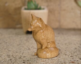 Mahogany Fox Figurine: Carved Wooden Sculpture
