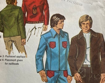 May include: Vintage Simplicity sewing pattern featuring illustrations of men's jackets and pantsuits. The pattern includes a green jacket with a heart design, a red jacket with a lantern, a blue suit with red pockets, and a brown jacket with matching pants. The pattern is for size 38.