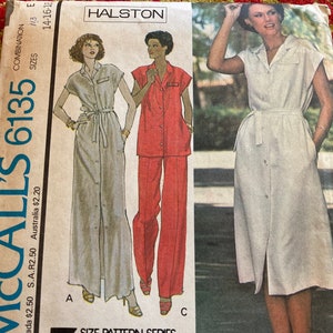 May include: A McCall's 6135 sewing pattern envelope by Halston for a misses' dress or top and pants. The cover features illustrations and a photograph of three garment variations, including a long dress, a top with pants, and a midi-length dress.