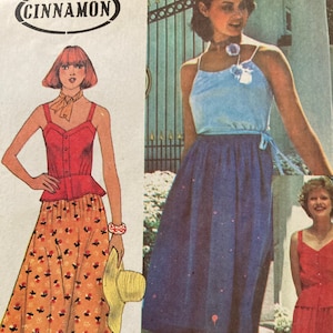 Puede incluir: Un patrón de costura vintage con tres mujeres que llevan diferentes estilos de vestidos. El patrón se llama "Cinnamon" y contiene instrucciones para hacer una blusa sin mangas y una falda.