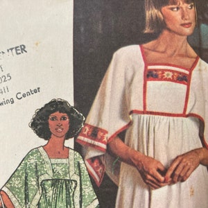 May include: Two women modelling different styles of dresses. The woman on the left is wearing a green and white patterned dress with a square neckline. The woman on the right is wearing a white dress with red trim and a floral design. The text "Fabric Center" is visible in the top left corner of the image.