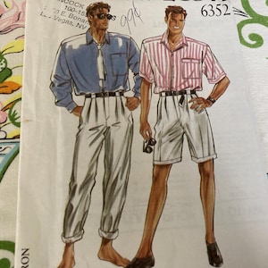 May include: A sewing pattern envelope labeled 6352 featuring illustrations of two outfits. One shows a long-sleeved blue button-down shirt with light-colored trousers. The other shows a short-sleeved pink and white striped shirt with light-colored shorts.