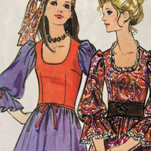 May include: Illustration of two women in vintage dresses. One dress is orange and purple with long sleeves and a bow at the waist. The other dress is paisley with a brown corset-style belt and ruffled sleeves.
