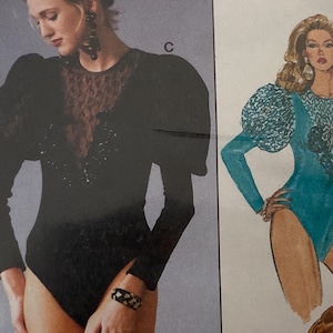 May include: A vintage fashion illustration featuring two women's bodysuits. One is black with sheer lace and sequin detailing, the other is teal with lace accents and puffy sleeves. The illustration is a retro style.