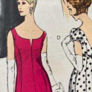 May include: Two women wearing formal dresses. The woman on the left is wearing a sleeveless, red dress with a V-neckline. The woman on the right is wearing a white dress with black polka dots and a short sleeve.
