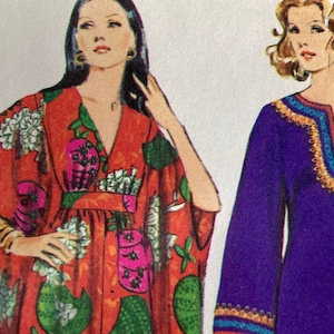 May include: Two women wearing long dresses. The woman on the left is wearing a red and green floral print dress with a V-neck. The woman on the right is wearing a purple dress with a colorful trim around the neckline.