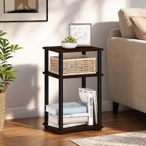 May include: A three-tier end table with dark brown wooden shelves and four black cylindrical support poles. The top shelf holds a small white bowl with a succulent, the middle shelf contains a woven basket, and the bottom shelf holds books.