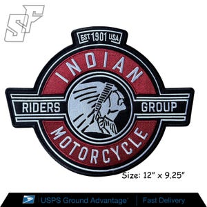 May include: A circular embroidered patch featuring the Indian Motorcycle Riders Group logo with a red background, black borders, and white text. The center displays a profile of a person in a headdress. Text includes EST 1901 USA, and the size is 12 inches by 9.25 inches.
