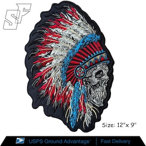 May include: An embroidered patch featuring a skull wearing a Native American-style headdress with red, white, and blue feathers. The design includes a blue and red headband with geometric patterns. The patch measures 12 inches by 9 inches.