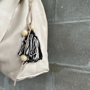 Cream Colored Leather Oversized Satchel, Summer Weight with Live Edge Flap, African, Wooden and Black Glass Beads, Yarn Tassel image 3