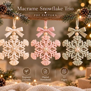 May include: Three macrame snowflake ornaments in cream, soft pink, and sage green, each featuring a central pearl, a matching satin ribbon bow, and a wooden bead hanger. The text reads Macrame Snowflake Trio PDF PATTERN, Beginner Friendly, Digital Download, 12 Pages.
