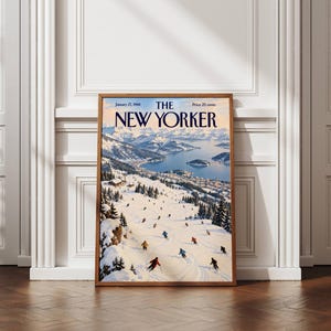 May include: A framed print of The New Yorker magazine cover dated January 27, 1968, priced at 25 cents. The illustration depicts a snowy mountain landscape with a lake, a town, and numerous skiers descending a slope covered in white snow and pine trees.