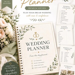 Peut inclure: Un planificateur de mariage à reliure spirale avec une couverture crème ornée d'anneaux dorés, de feuilles vertes et du texte "THE ULTIMATE WEDDING PLANNER". Inclut des pages pour la liste de contrôle, le budget, le planning et des idées.
