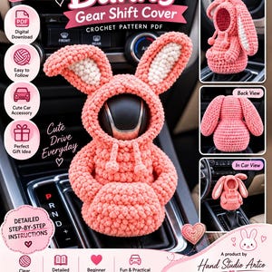 May include: A crochet bunny gear shift cover pattern PDF featuring a pink hooded design with white inner ears. The digital download includes detailed step-by-step instructions, photos, and a beginner-friendly guide for creating this car accessory.