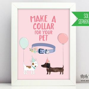 May include: A framed print with a pink background features the text "MAKE A COLLAR FOR YOUR PET." It includes illustrations of a blue collar, two dogs wearing party hats, and balloons. The print is in a white frame.