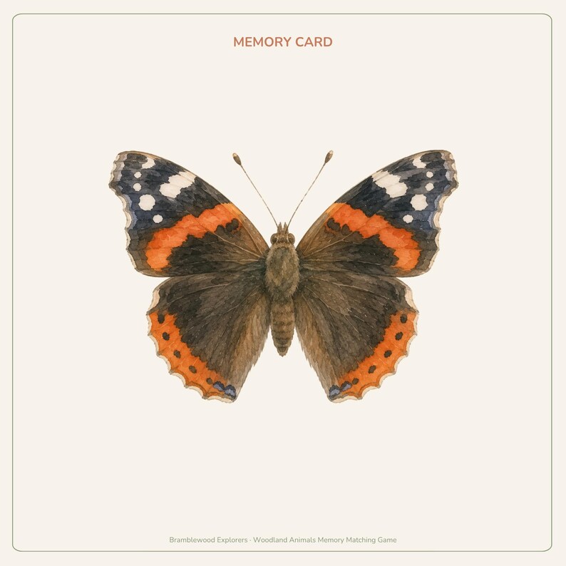 Peut inclure: Une carte m&eacute;moire carr&eacute;e pr&eacute;sentant une illustration &agrave; l'aquarelle d'un papillon Vulcain avec des ailes brun fonc&eacute;, des bandes orange et des taches blanches. Le texte MEMORY CARD est imprim&eacute; en haut et Bramblewood Explorers Woodland Animals Memory Matching Game en bas.