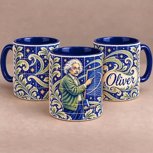 May include: Three ceramic mugs with a deep blue interior and handle. The exterior features a grid pattern with Albert Einstein writing on a chalkboard, swirling green leaf motifs, and the name Oliver written in a cursive script on one mug.