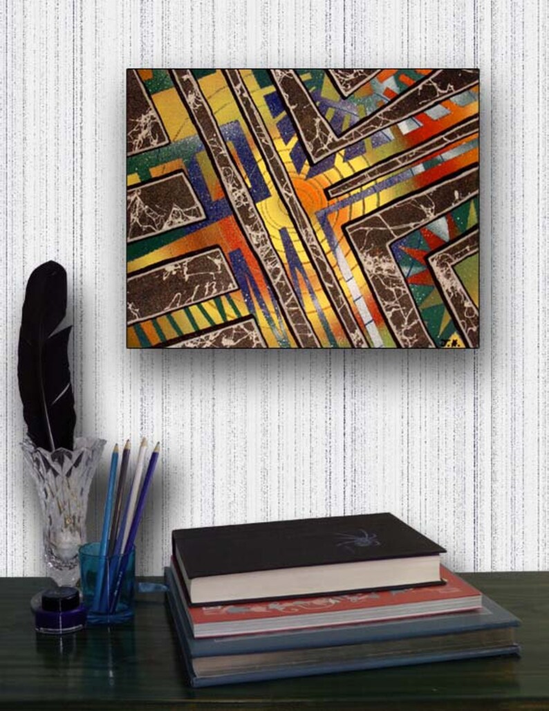 May include: Abstract painting with geometric shapes in shades of brown, yellow, green, blue, and orange. The painting has a textured surface and is framed in black.