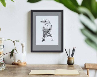 May include: Black and white ink drawing of a bird perched on a branch, framed in a black frame and hanging on a white wall.